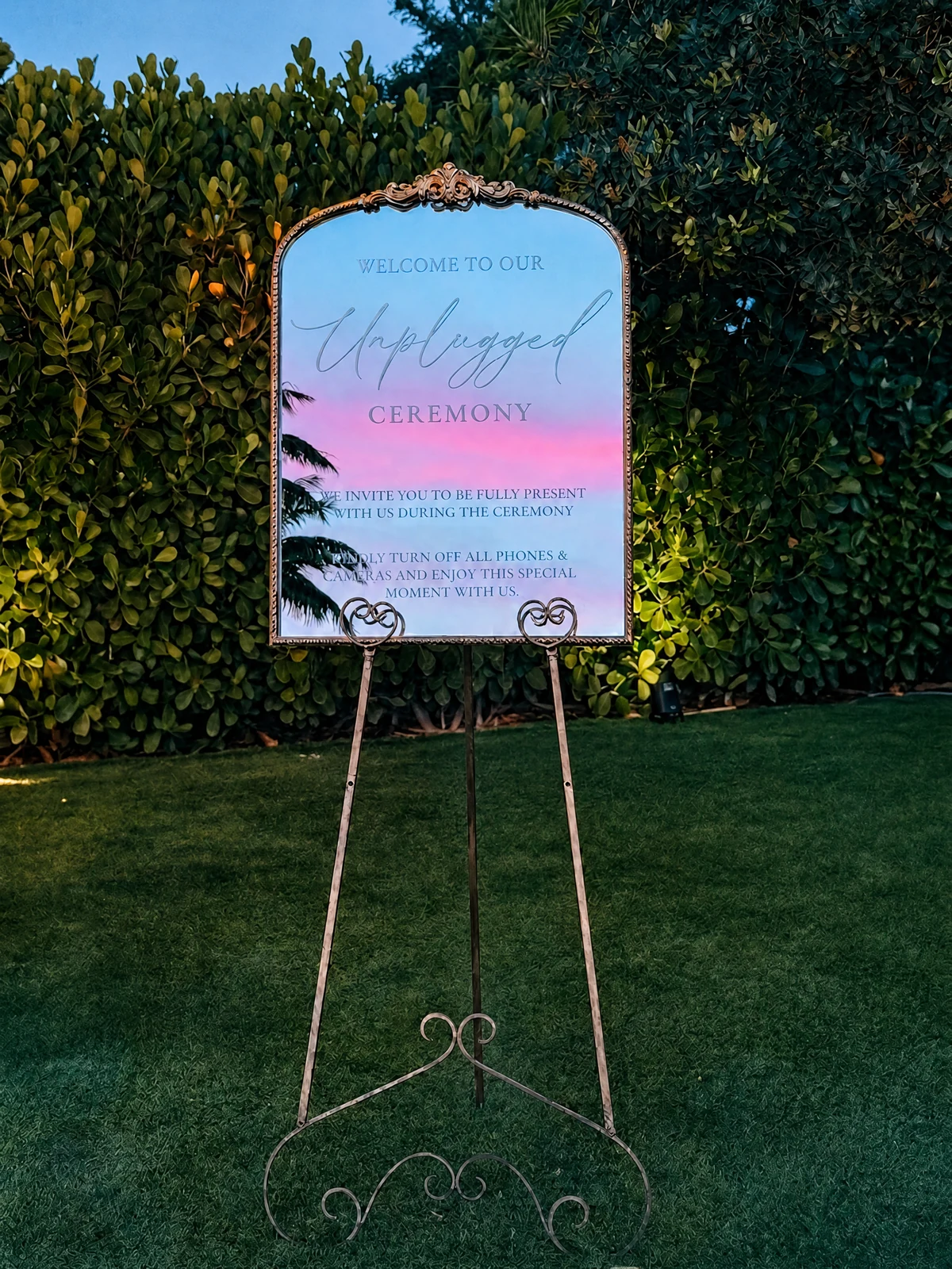 Vintage Unplugged Ceremony Mirror rental for a Miami wedding event with an antique frame, custom unplugged ceremony lettering, and included easel by Be Extra Miami.